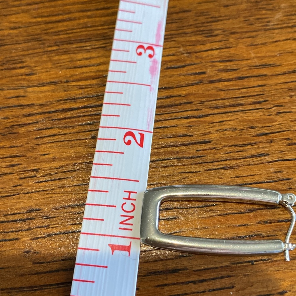 Silver 1.5 in rectangle pierced earrings. Very secure and light. They are pretty - Picture 12 of 12